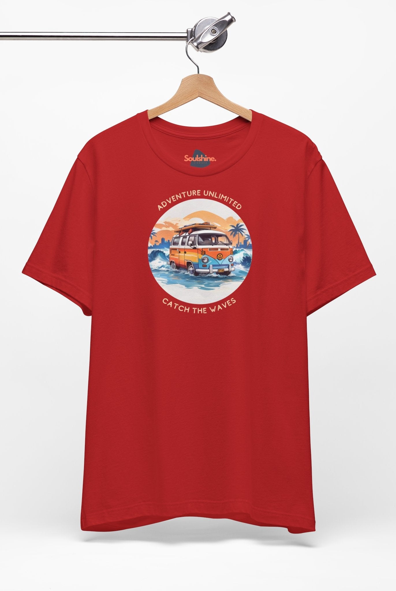 Direct-to-garment printed red t-shirt with ’Adventure Unlimited - Surfing T-Shirt’ design on it