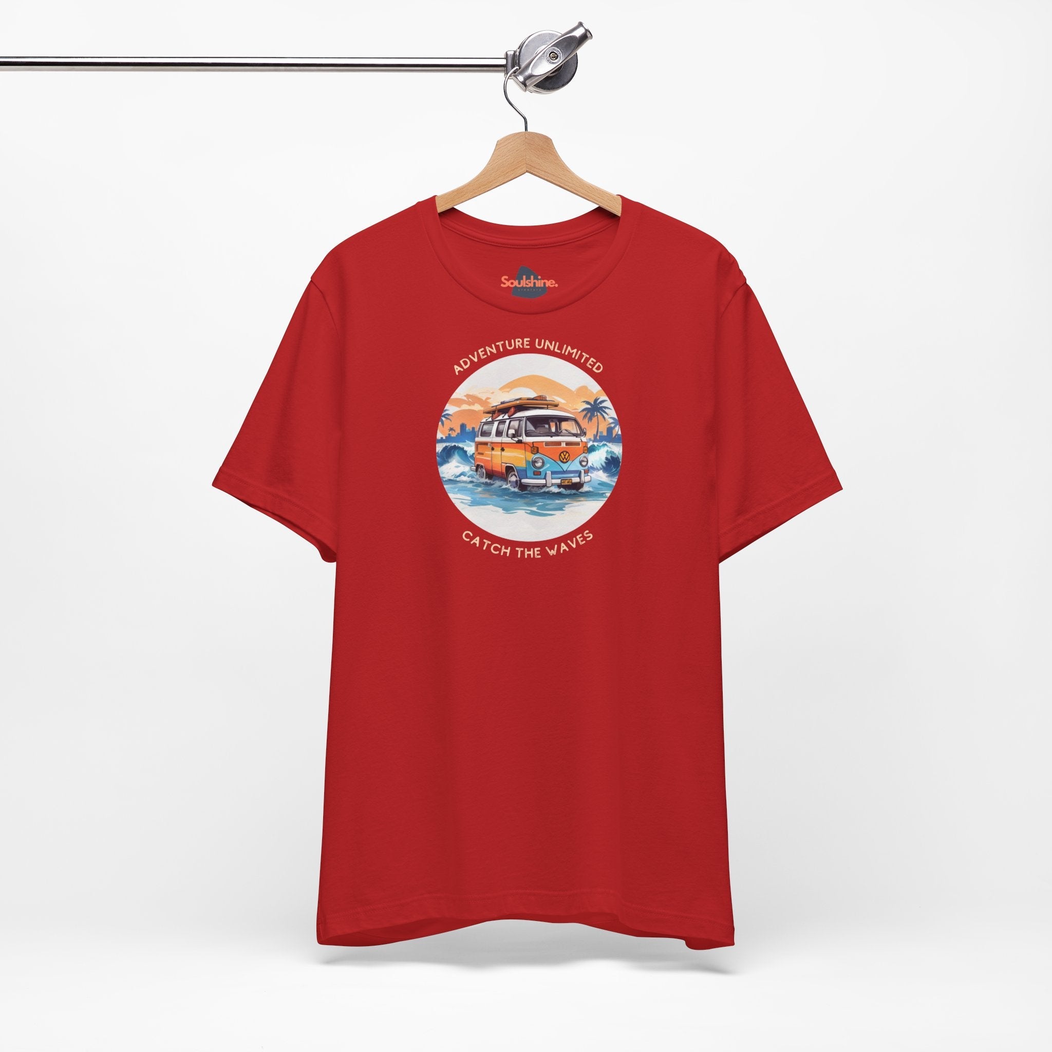 Direct-to-garment printed red t-shirt with ’Adventure Unlimited - Surfing T-Shirt’ design on it