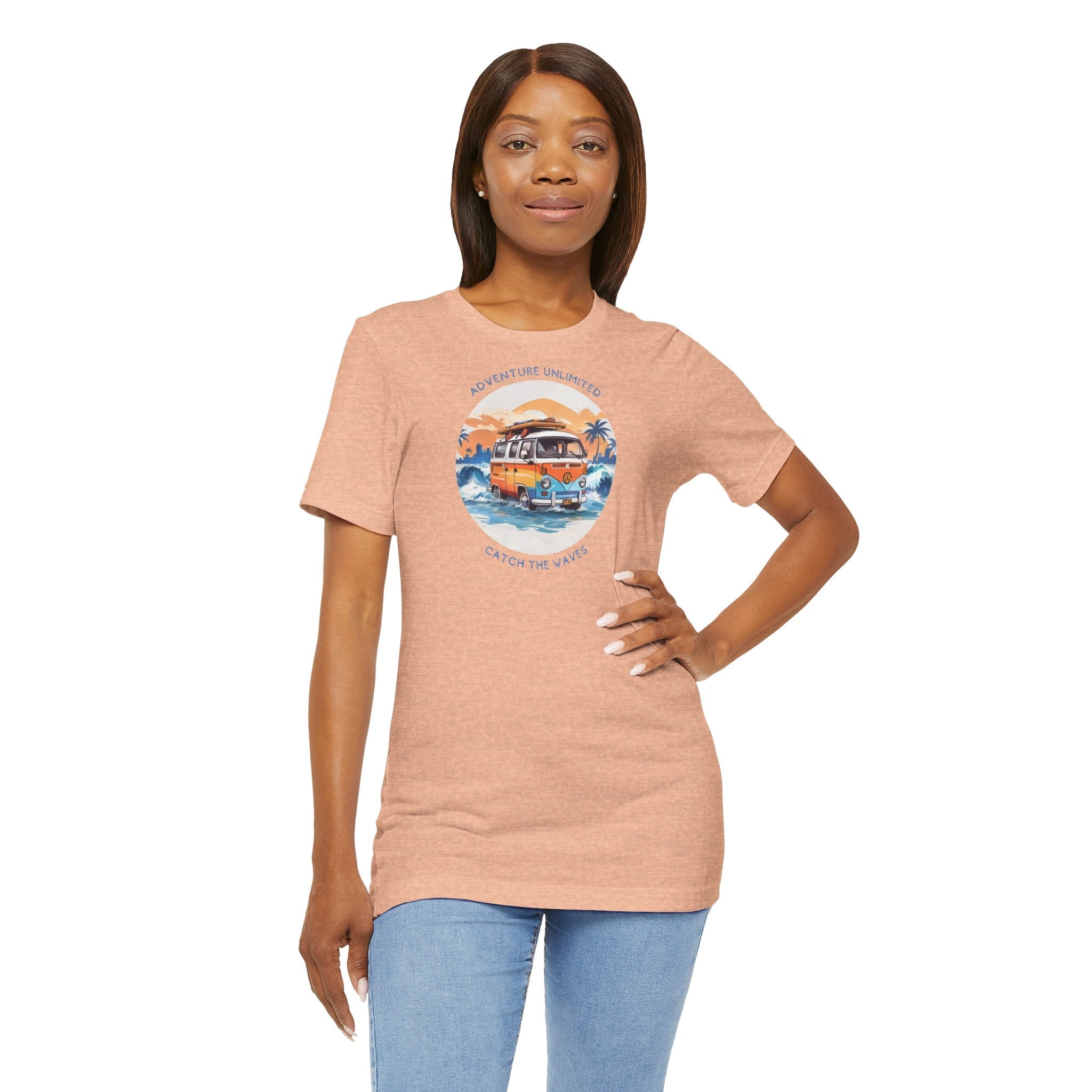Adventure Unlimited Surfing T-Shirt: woman in peach tee with ’the best day is a day’ - direct-to-garment printed item