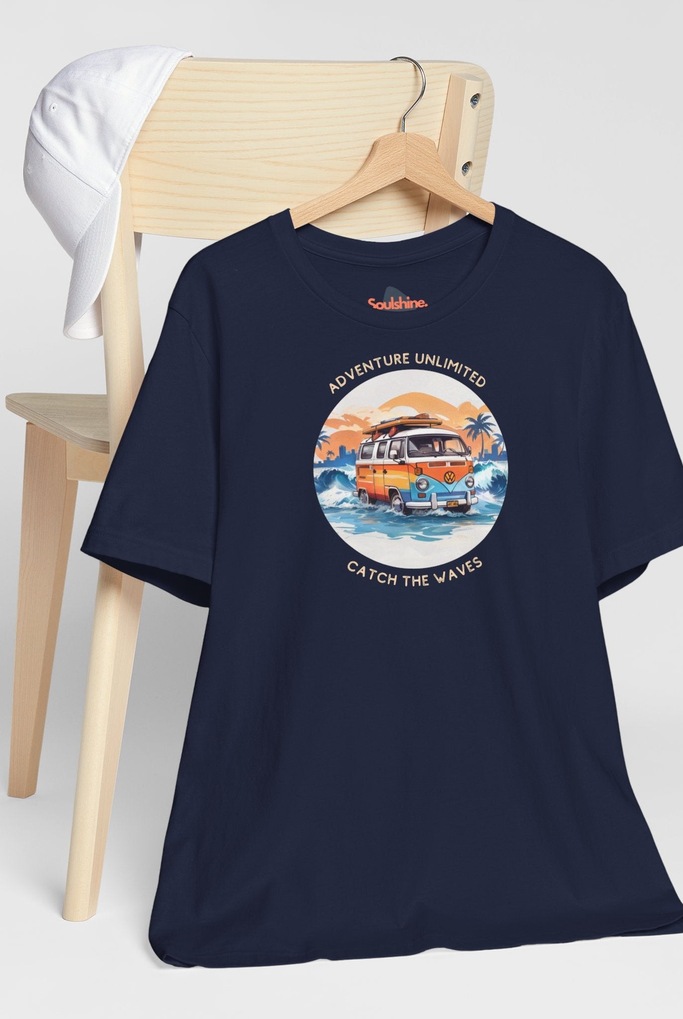 Adventure Unlimited Surfing T-Shirt featuring sunset graphic on navy Bella & Canvas EU printed item