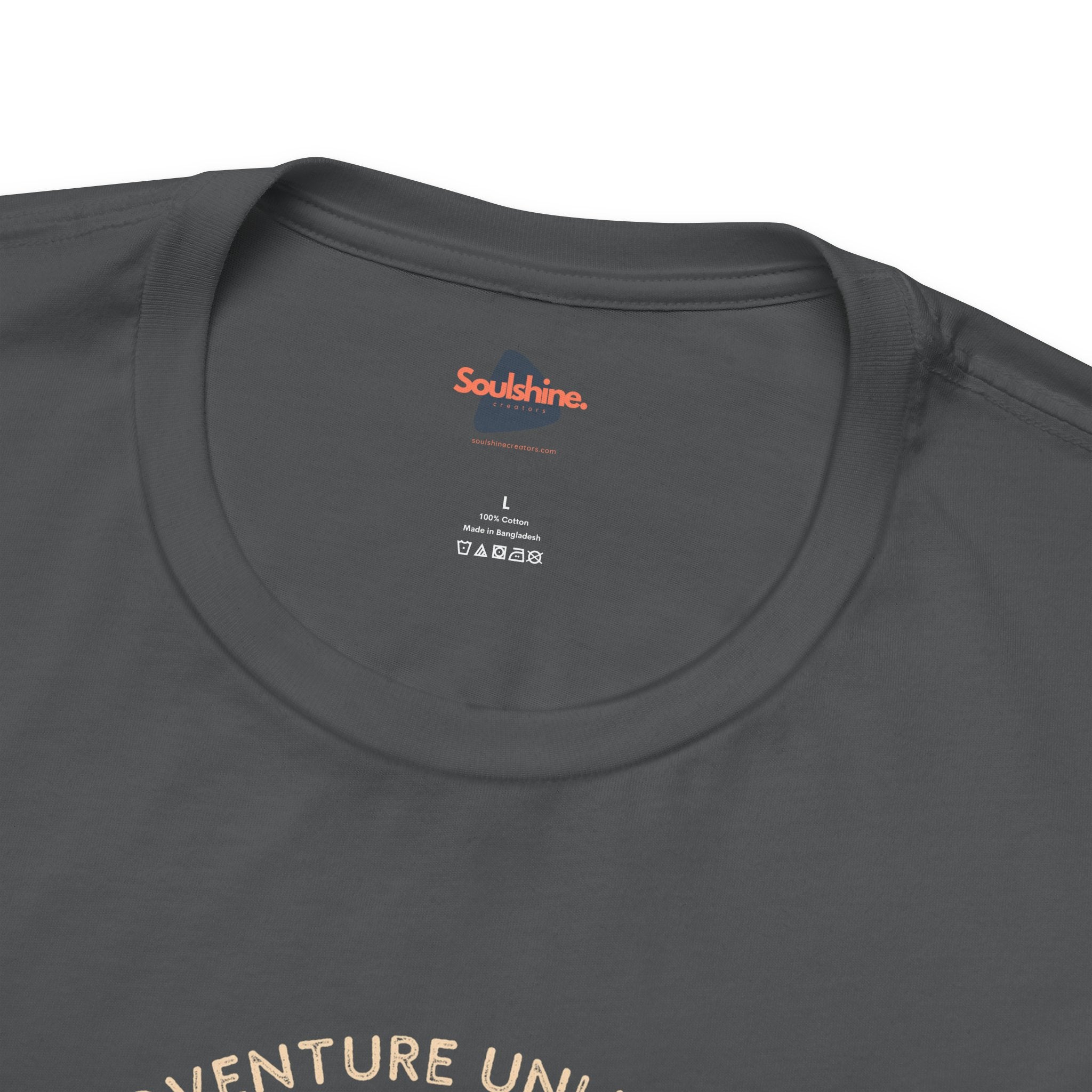 Adventure Unlimited charcoal grey t-shirt with printed text on the back
