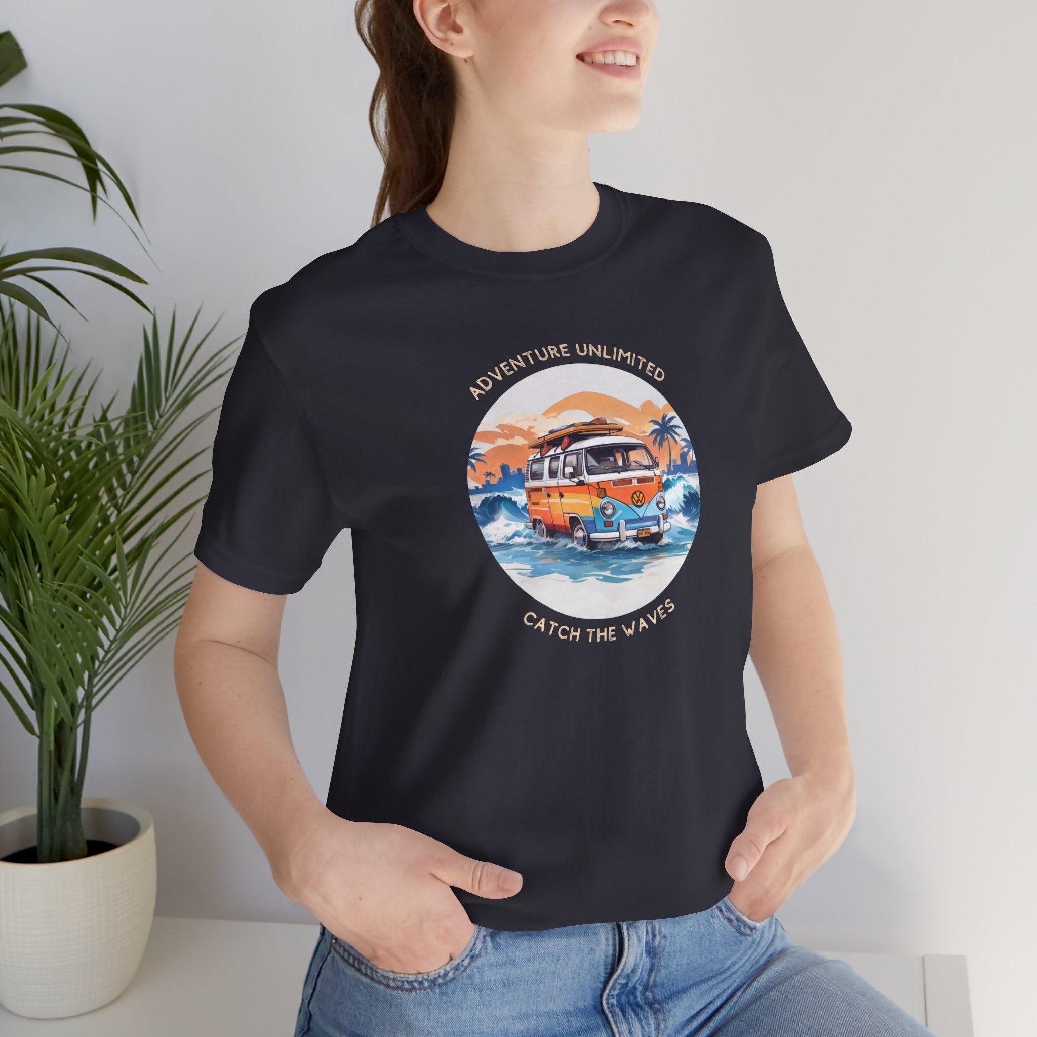 Woman wearing Adventure Unlimited black t shirt with ’Adventure Unlimited - Unisex Jersey Short Sleeve Tee’ printed design